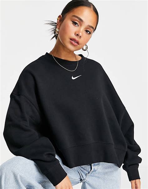 Nike oversized boxy sweatshirt - COLOUR: Oatmeal. Product Code 1676469. Buy Nike mini swoosh oversized boxy sweatshirt in oatmeal at ASOS. With free delivery and return options (Ts&Cs apply), online shopping has never been so easy. Get the latest trends with ASOS now.